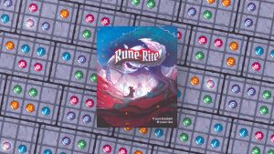 The box for Rune Rite sitting atop a field of Rune Rite cards.
