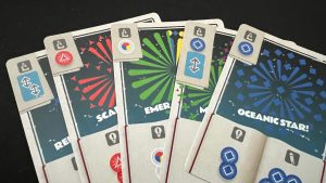 A hand of five Pyrotechnics cards fanned out. Courtesy of Gaming Trend.