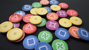 A pile of Pyrotechnics spark tokens. Courtesy of Gaming Trend.