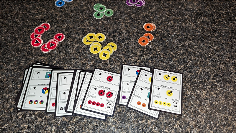An early prototype of the Pyrotechnics board game, before it had a theme and was called, simply, Resourceful.