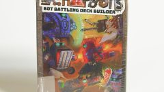 Scrapbots front-facing photograph of the box still in shrinkwrap
