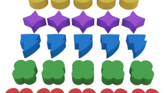Wooden token components for the board game Witchbound